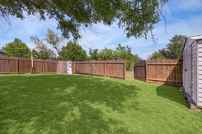 back yard has a gate with access to adjacent greenspace | Image 25