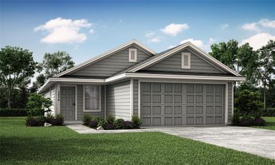 View of front facade with a garage and a front lawn | Image 1