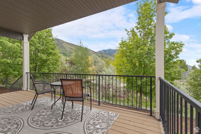 Wooden deck with a mountain view | Image 35