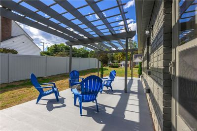 View of patio / terrace featuring a pergola | Image 2