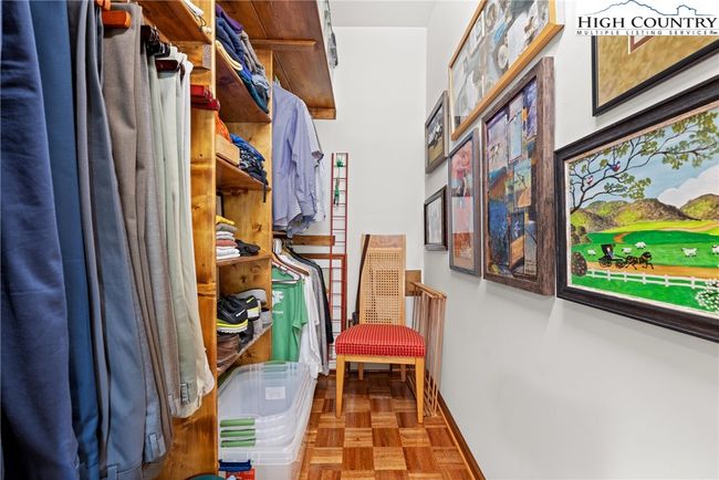 Primary closet in bedroom | Image 19