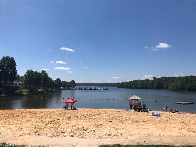 Sandy beach & lake access swim area..the resort Marina pictured in the background | Image 47