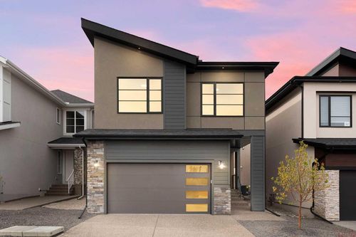 56 Coulee Crescent Sw, Home with 4 bedrooms, 3 bathrooms and 4 parking in Calgary AB | Card Image