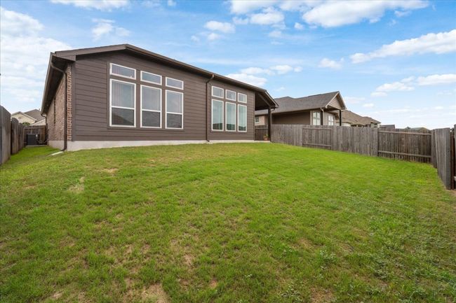 181 Durian Loop, House other with 3 bedrooms, 2 bathrooms and null parking in Buda TX | Image 23