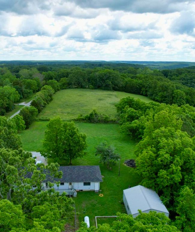 Drone View of yard and field from back | Image 4