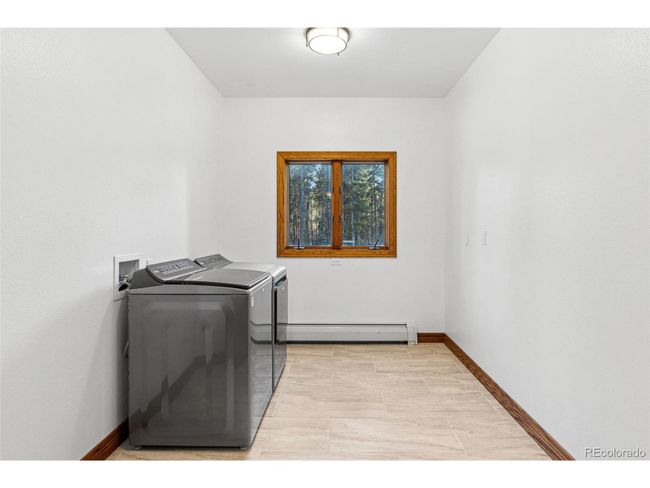9303 Dauntless Way, House other with 4 bedrooms, 4 bathrooms and null parking in Conifer CO | Image 24