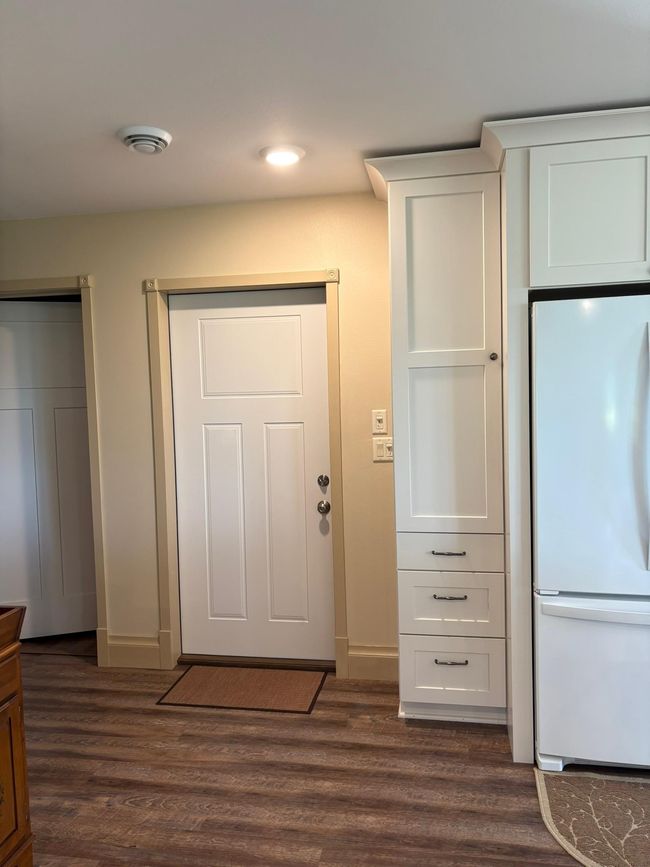 Kitchen door leading out to the Mud Room | Image 27