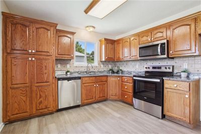 Eat-In Kitchen with New Appliances, New Flooring and New Countertops! | Image 3