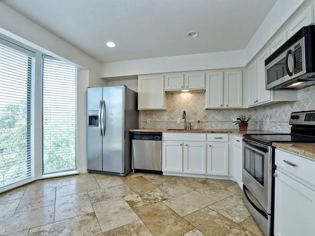 168 World Of Tennis Sq, Condo with 3 bedrooms, 3 bathrooms and 2 parking in Lakeway TX | Image 10