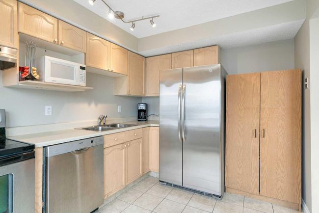 219 Coachway Lane Sw, Townhouse with 3 bedrooms, 3 bathrooms and 2 parking in Calgary AB | Image 13