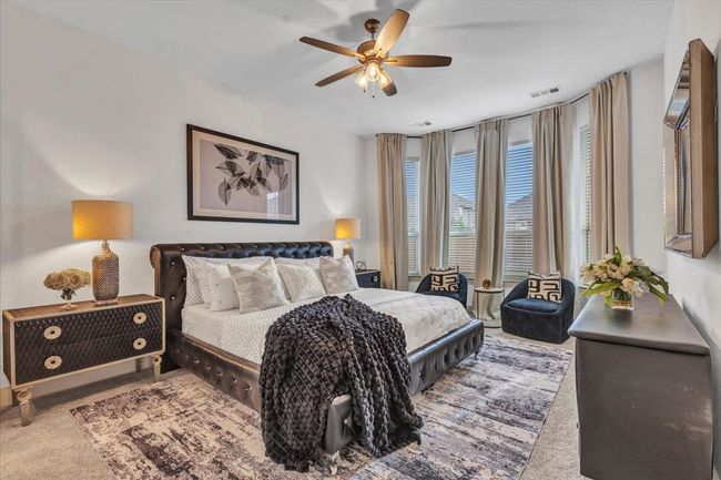 The master bedroom has a sitting area with long windows for your retreat and peaceful get-away. | Image 17