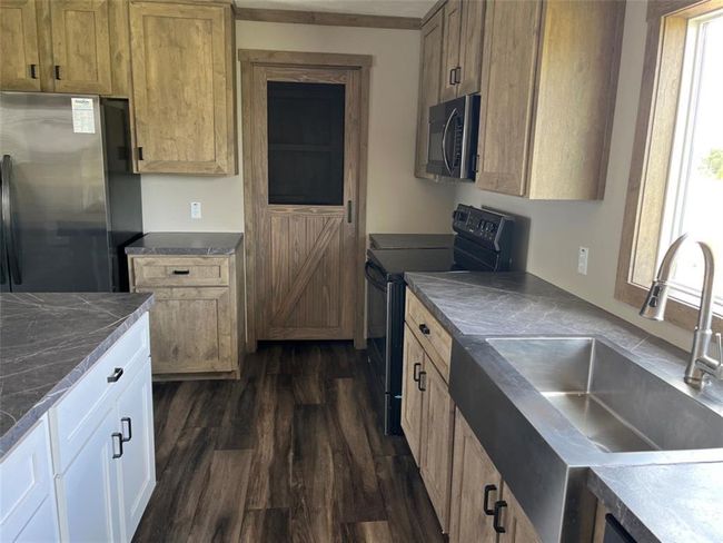Island kitchen and walk in pantry. All Electric. | Image 5
