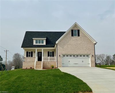 Exterior colors may vary from photo - photo is same floor plan/elevation built at another location | Image 1