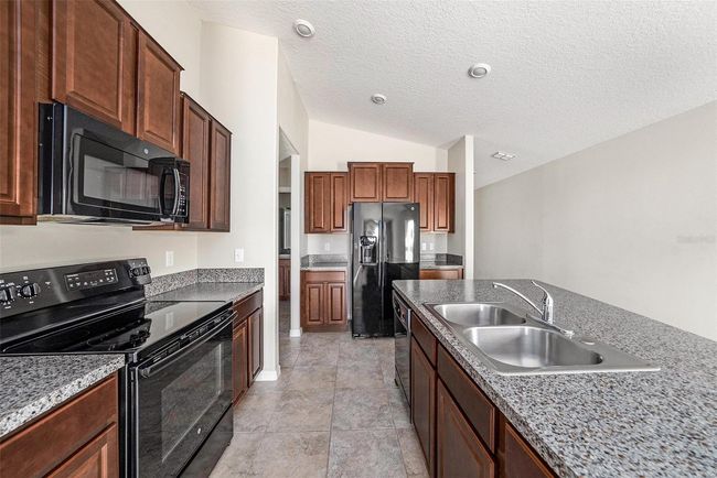 7211 Ozello Trail Ave, House other with 3 bedrooms, 2 bathrooms and null parking in SUN CITY CENTER FL | Image 12