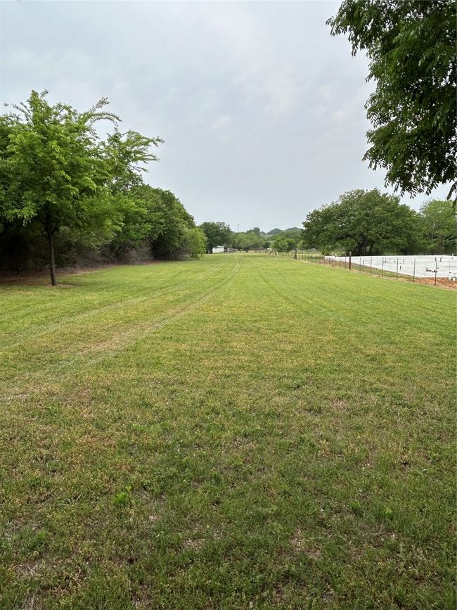 View of yard with​​‌​​​​‌​​‌‌​‌‌​​​‌‌​​‌‌​‌​​​​​‌ fence | Image 21