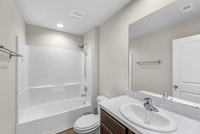 Secondary bedrooms have a large and full bathroom conveniently located in the hall between them. Toilet has bidet! | Image 37