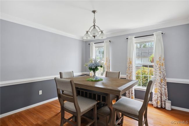 Crown molding, chair rail and hardwood floors add elegance to the Dining Room | Image 5