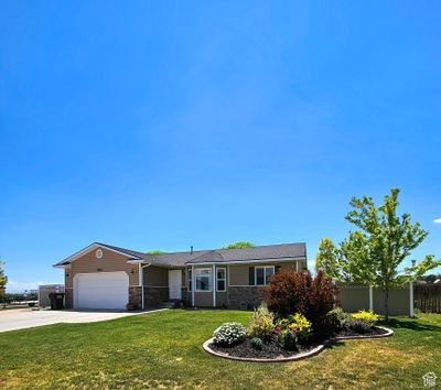 734 E 2680 S, House other with 5 bedrooms, 2 bathrooms and 2 parking in Naples UT | Image 2