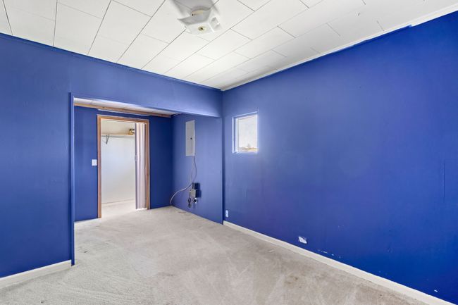 Carpeted spare room with baseboards | Image 30