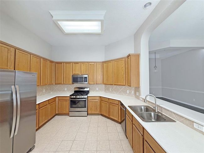 4718 Orchard Blossom Way, House other with 3 bedrooms, 2 bathrooms and 2 parking in Houston TX | Image 6