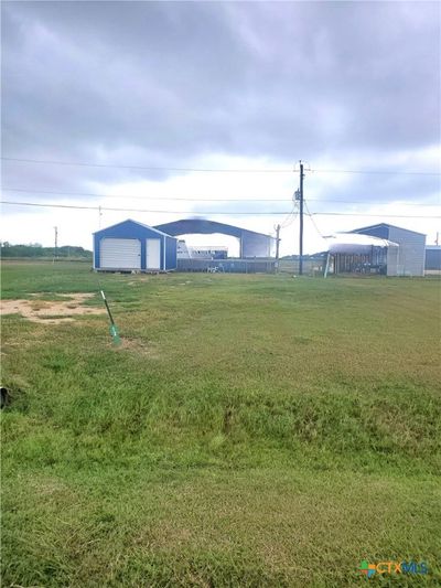 #12 Sandhill Lane is Lot 17 (60'x110') with RV pad, all services, 320sqft storage shed. Culvert/driveway access. DEED RESTRICTED TO NO MOBILE OR MODULAR UNITS. | Image 1