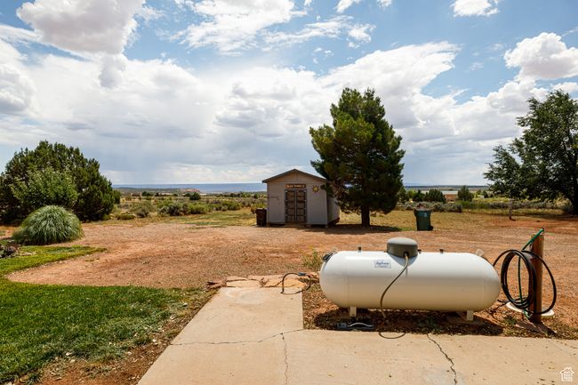 View of yard featuring a storage shed | Image 32