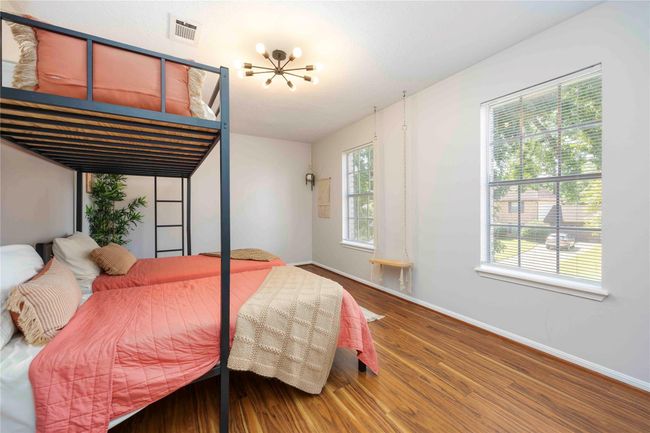 Spacious, well-lit bedroom with two windows—perfect for guests, children, a study, or a flexible multi-purpose space. | Image 34