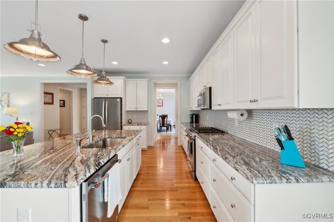 Ample storage & countertop space. Note the drawers to the right of the kitchen. | Image 10
