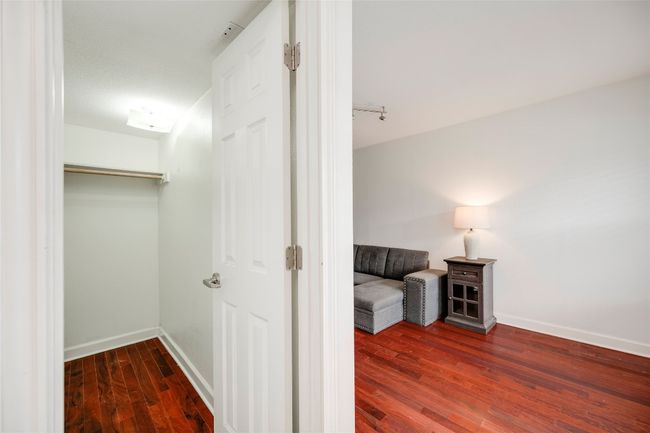 Corridor featuring wood finished floors and baseboards | Image 26