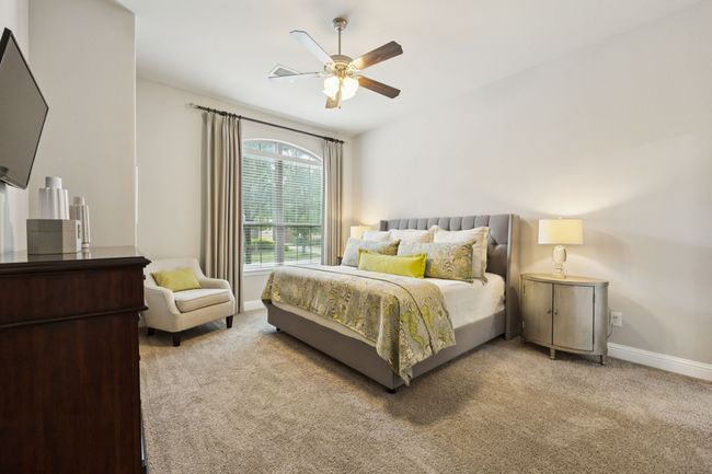 Carpeted bedroom with baseboards and ceiling fan | Image 11