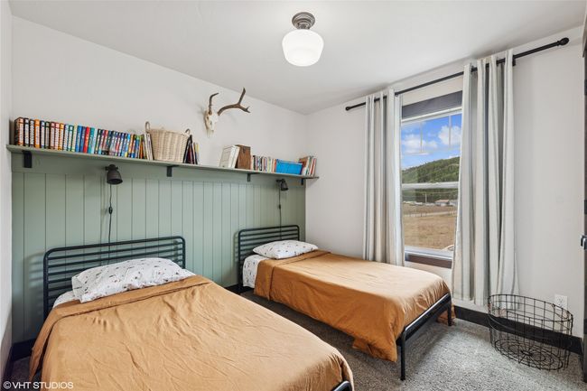 Bedroom featuring carpet | Image 30