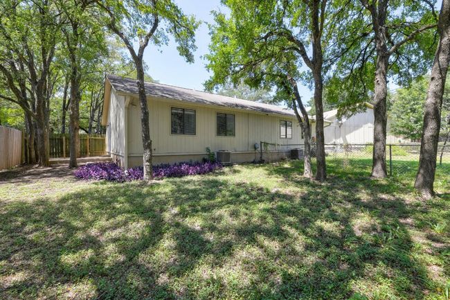 Back of house with cooling unit | Image 13