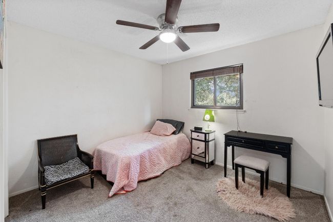 Bright and comfortable, the guest bedrooms feel anything but secondary—each one offering plenty of space and natural light | Image 18