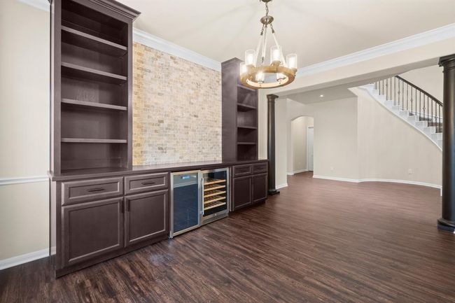 Dining room with wine fridge and regular fridge | Image 14