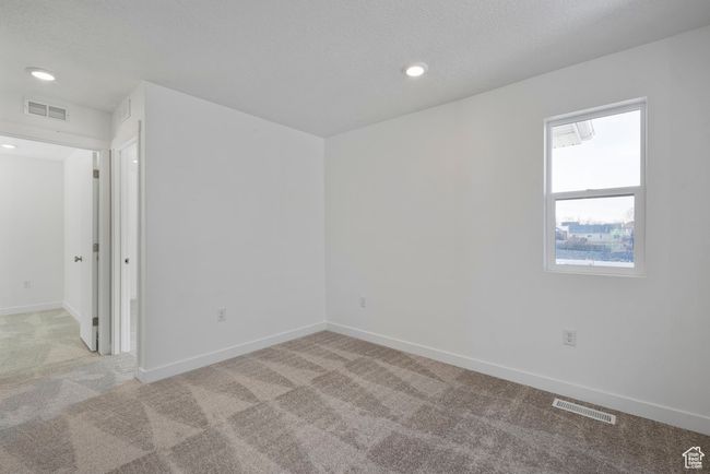 A bright, versatile bedroom ready to be your guest room, nursery, teen space, or home office—adaptable to fit your lifestyle and needs. | Image 11
