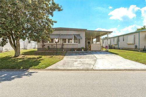 1069 Manila Dr, Barefoot Bay, FL, 32976-6703 | Card Image