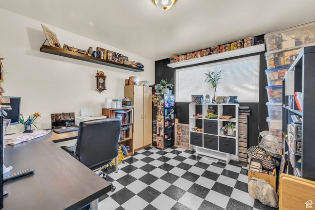 Home office featuring tile patterned floors | Image 14