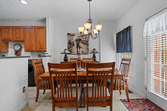 The eat in area is spacious. | Image 15