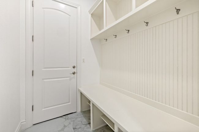 Mudroom with light marble finish floors | Image 34
