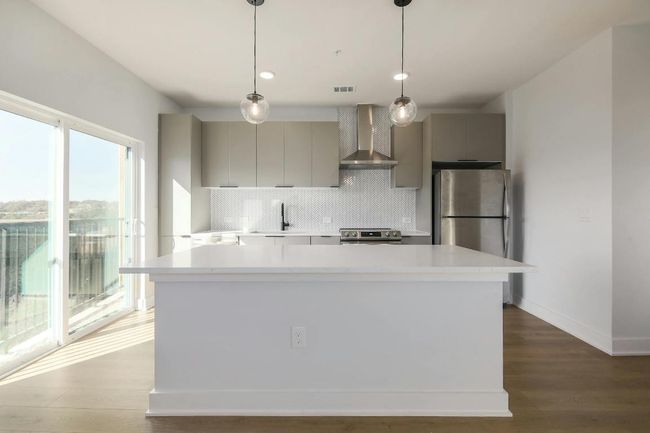 Modern Kitchen with quartz countertops & stainless steel appliances | Image 7
