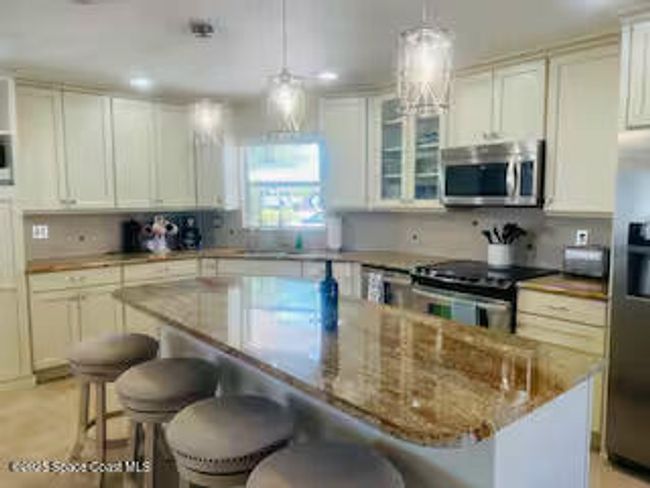 418 Brightwaters Dr, House other with 4 bedrooms, 2 bathrooms and null parking in Cocoa Beach FL | Image 11