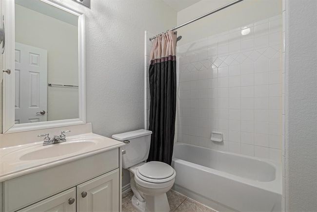 And this private bathroom is adjacent to the 3rd secondary bedroom, making it perfect for live-in help, the in-laws during a visit or a kid moving back into the nest home from college! | Image 34