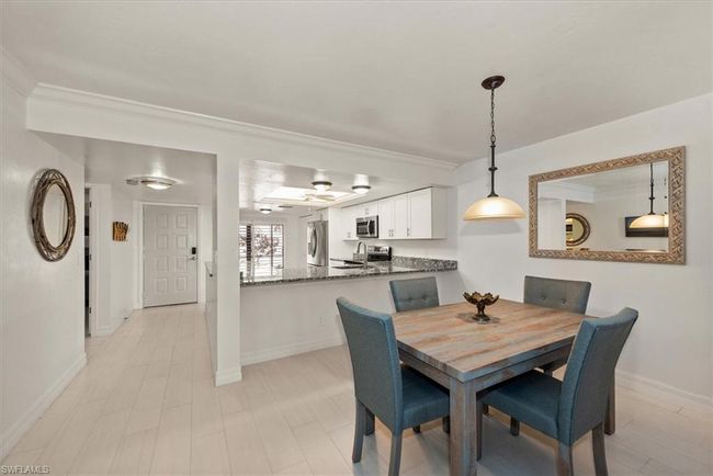 Dining space featuring ornamental molding and baseboards | Image 12