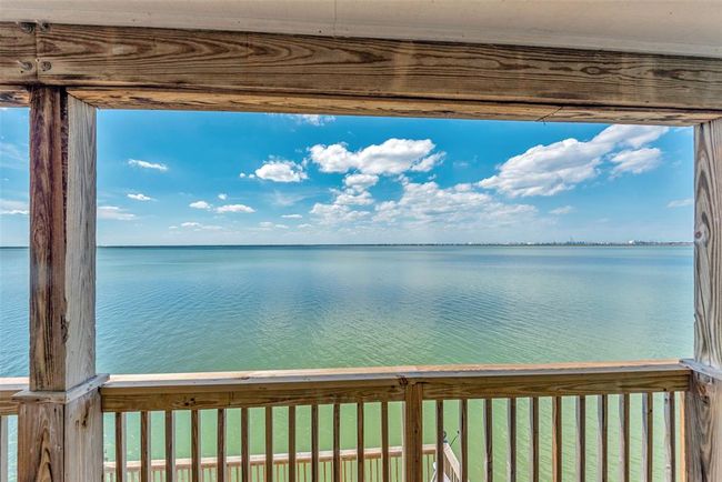 Just water, sky, and you. Enjoy front-row views of the bay from the upper balcony—no distractions, just peace. | Image 28