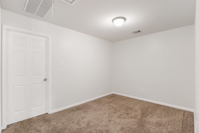 Carpeted spare room featuring baseboards | Image 23