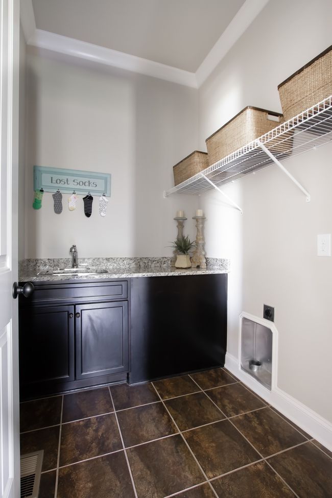 The laundry also includes a sink. | Image 31