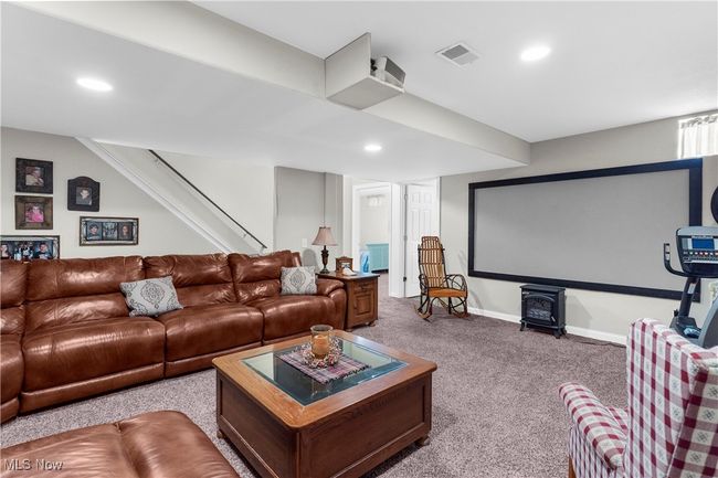 Lower Level Family Room with 80" Projector Screen | Image 29