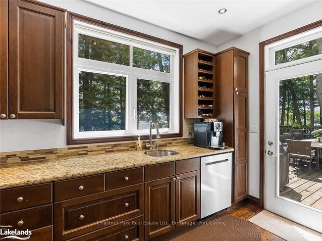 Convenient walk out to deck from kitchen | Image 22