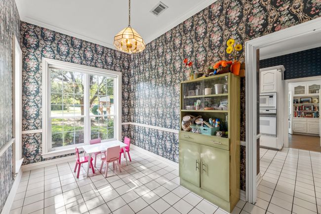 Room between kitchen and garage entry. Woudl make a great breakfast nook, mud room, or office. | Image 18
