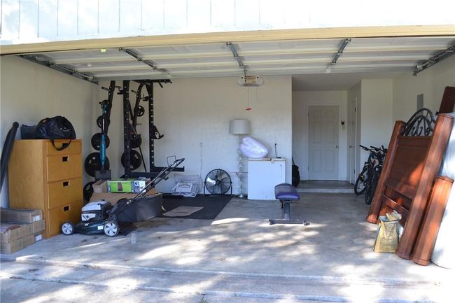Garage featuring a garage door opener | Image 19